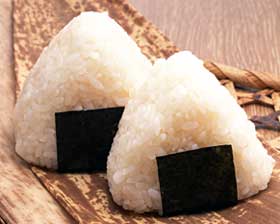 Riceballs, in Japanese: onigiri.  Most definitely NOT donuts.